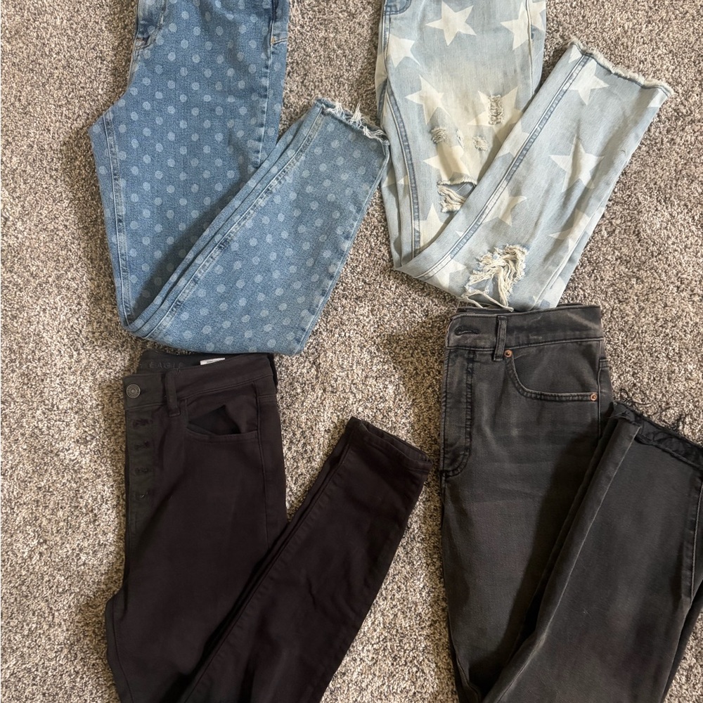 Four pairs of jeans, two from American Eagle Outfitters. Size 4